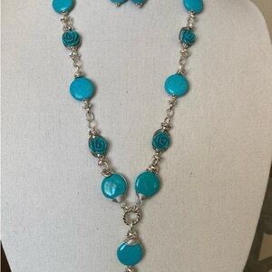 Turquoise and Silver Necklace with Floral Accents